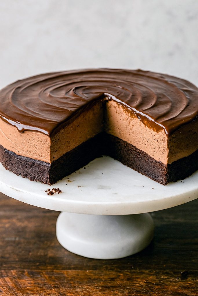 Slice of decadent Chocolate Cake With Chocolate Mousse, inspired by French Mousse Cake, with a rich chocolate base and silky mousse topping, perfect for anyone searching Frosting Ideas For Chocolate Cake or a quick Chocolate Mousse Recipe Easy, also shown as a Mini Mousse Cake version.