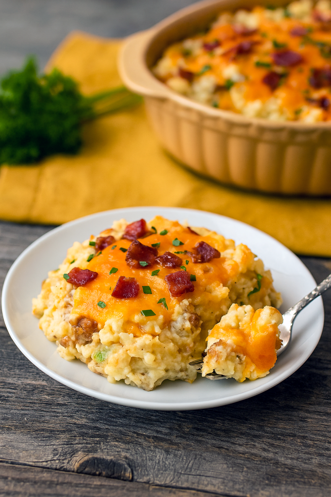 A bubbling Twice Baked Potatoes Casserole studded with bacon and cheese, inspired by Sunny’s Easy Loaded Baked Potato Casserole, showcasing the best in Potato Recipes Side Dishes, Cheesy Chicken Bacon Potato Bake, and Loaded Cheesy Chicken Potato Casserole, also known as Cheesy Chicken & Bacon Potatoes, Sunny’s Easy Loaded Potato Casserole, Baked Potato Casserole, and Twice Baked Potatoes.