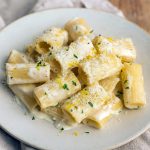 Bowl of creamy lemon pasta garnished with parmesan and parsley — a sunny Yellow Recipe shot that pairs with my Lemon Paste Recipe ideas and shows simple Lemon Paste Uses for extra citrus punch.