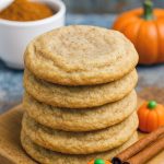 A dozen freshly baked Pumpkin Pie Spice Snickerdoodles cooling on a wire rack, each classic Snickerdoodles round showcasing the perfect crackle, ideal when following a trusted Snickerdoodle Recipe or exploring new Snickerdoodle Cookie Recipes.